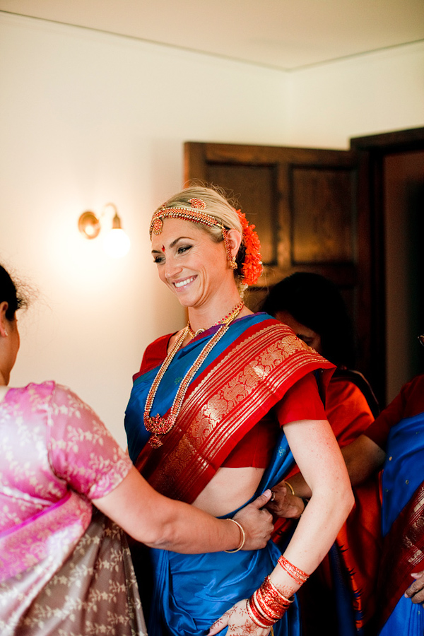 bride getting ready - traditional Indian wedding attire - photo by Chicago based wedding photographers Harrison Studio